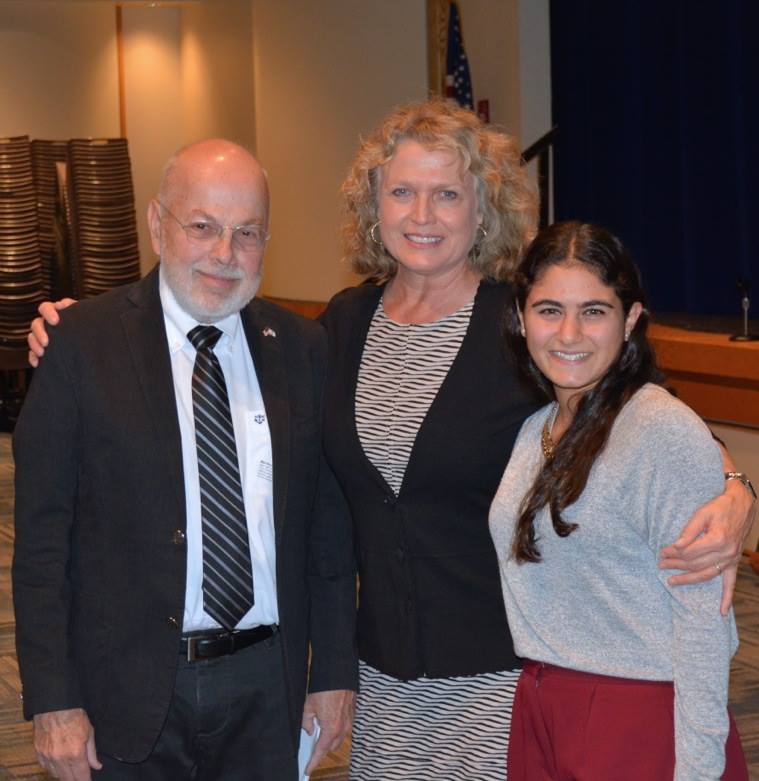 Gabi Kamran '15 standing on the right with Mrs. Mansfield and award giver. 