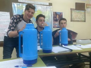 Brandon Ptasnik ('17), Noah Daniel ('17) and Sawyer Kroll ('17) drinking out of their 2 liter bottles.