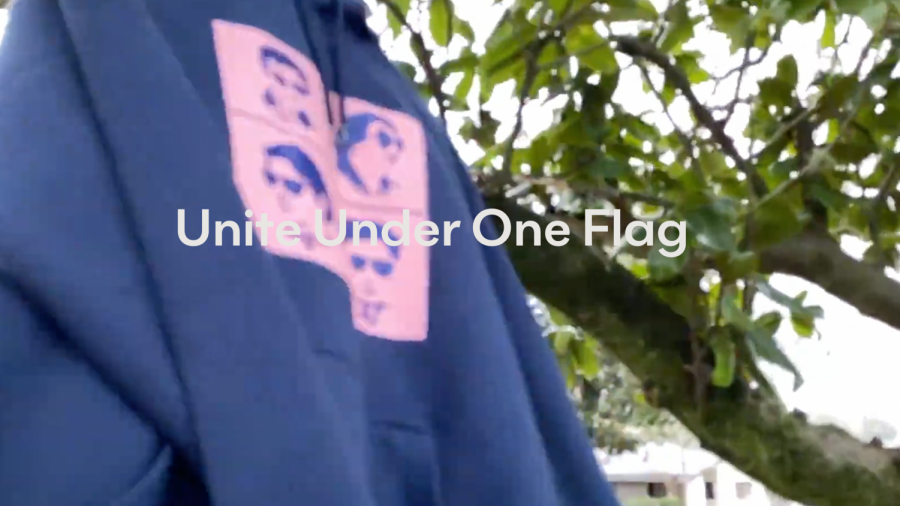 Milken House Party merchandise hoodie displayed with title United Under One Flag