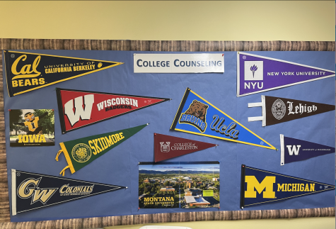 flags for different universities and colleges outside of the college counseling office at Milken