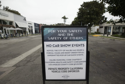 Sign posted by Malibu Country Mart security stating “NO CAR SHOW EVENTS”.