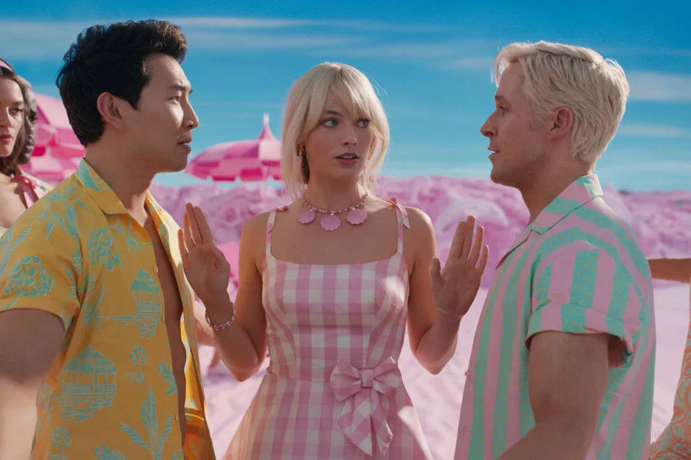 A still from Greta Gerwigs Barbie, starring Margot Robbie (center), and Ryan Gosling (right). Controversially, neither Gerwig nor Robbie was nominated for Best Director or Best Actress, respectively.