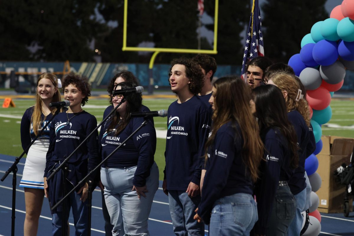 Milken's Kol Echad sings the American and Israeli National Anthems on Homecoming night