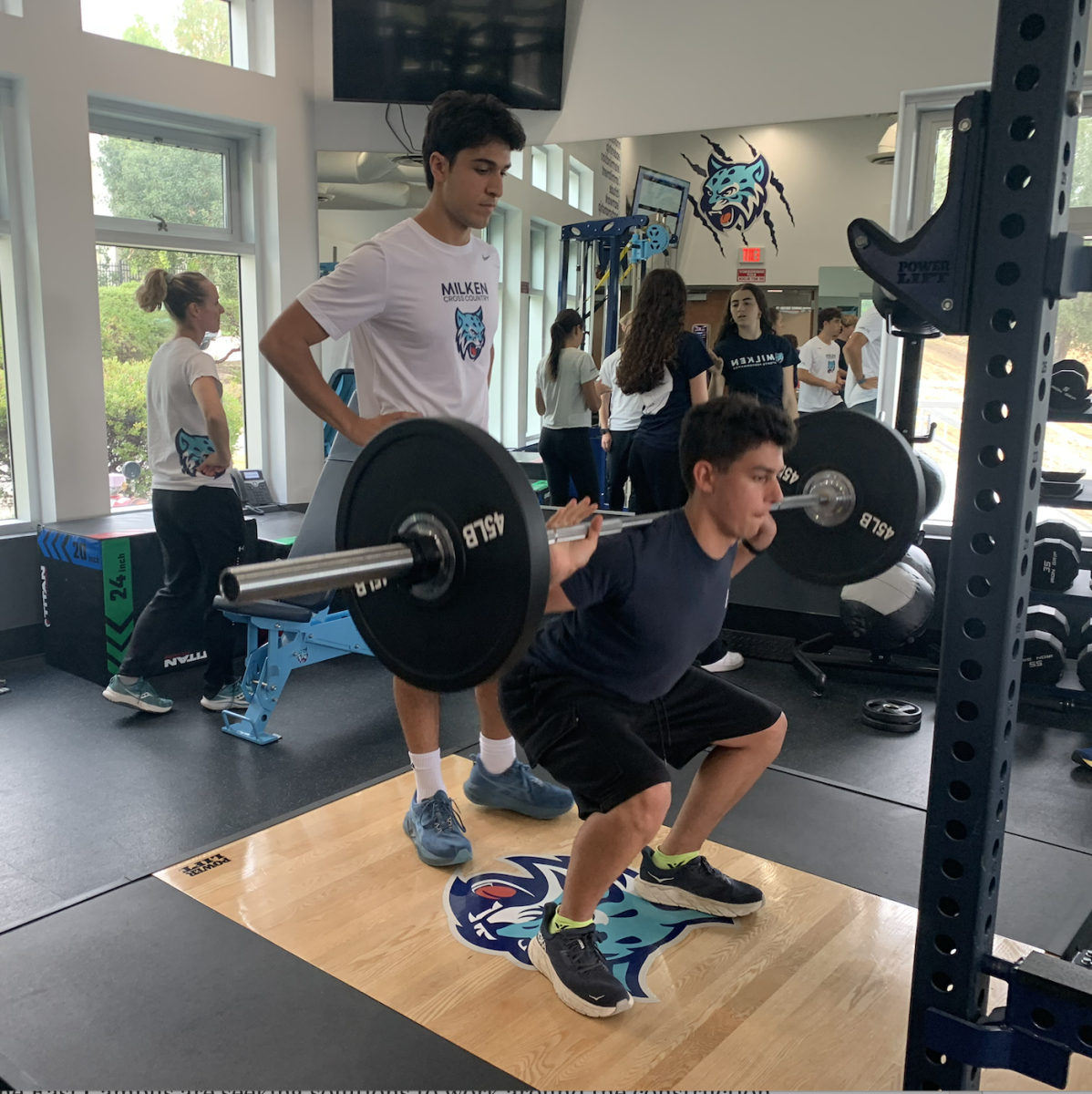 Bryan Friedrich '26 and Noah Tanna '27 in the Milken East weightroom 
