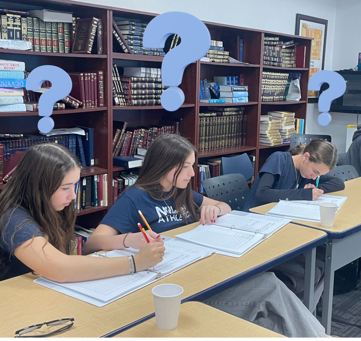 Students sitting in class pondering.
